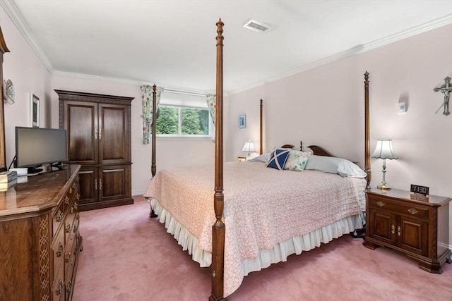 bedroom with light colored carpet and crown molding