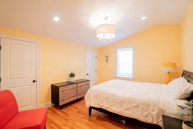 41 Washington Unit C, Newburyport, MA 01950 - bedroom with lofted ceiling, light wood-type flooring, baseboards, recessed lighting, and a chandelier
