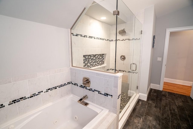 41 Washington Unit C, Newburyport, MA 01950 - full bathroom with a jetted tub, a shower stall, wood finished floors, and baseboards