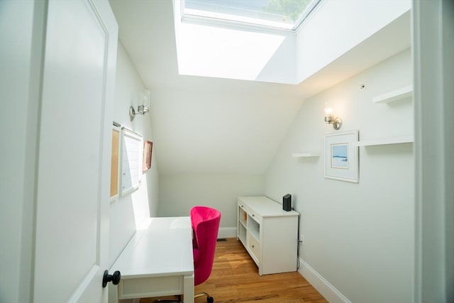 41 Washington Unit C, Newburyport, MA 01950 - office area with a skylight, vaulted ceiling, light wood-style floors, and baseboards