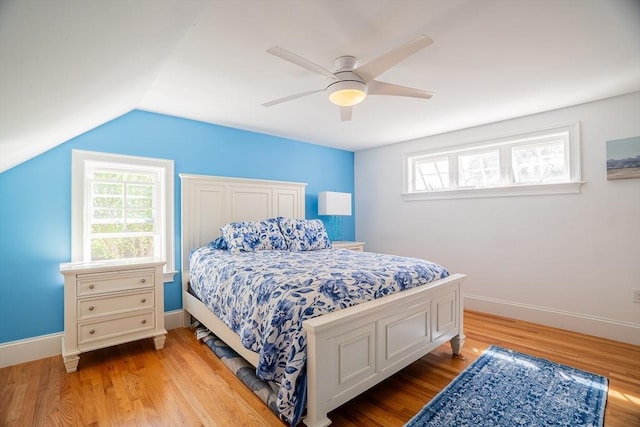 41 Washington Unit C, Newburyport, MA 01950 - bedroom with light wood-style flooring, ceiling fan, vaulted ceiling, and baseboards