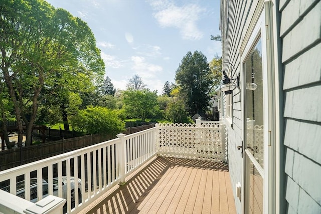 41 Washington Unit C, Newburyport, MA 01950 - wooden deck featuring view of wooded area