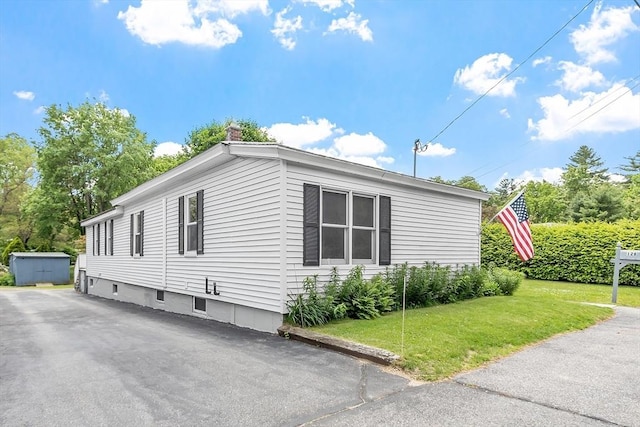 128 Arthur Ave, Athol, MA 01331 - view of home's exterior with a lawn and a chimney