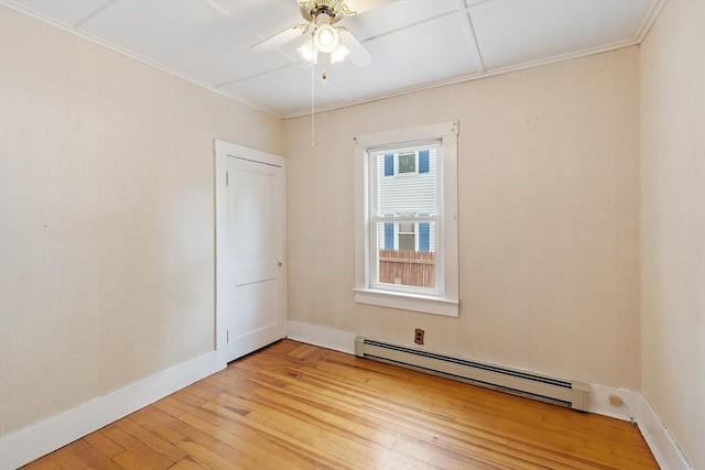 128 Arthur Ave, Athol, MA 01331 - empty room featuring ceiling fan, light wood-style flooring, baseboards, baseboard heating, and ornamental molding