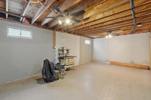 128 Arthur Ave, Athol, MA 01331 - basement with ceiling fan, healthy amount of natural light, and concrete block wall