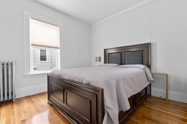11 Barr St, Salem, MA 01970 - bedroom featuring radiator heating unit and light wood-style flooring