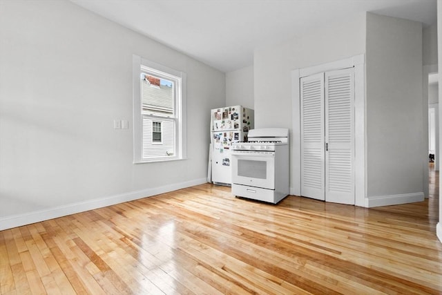 11 Barr St, Salem, MA 01970 - kitchen featuring white appliances and light wood-style flooring