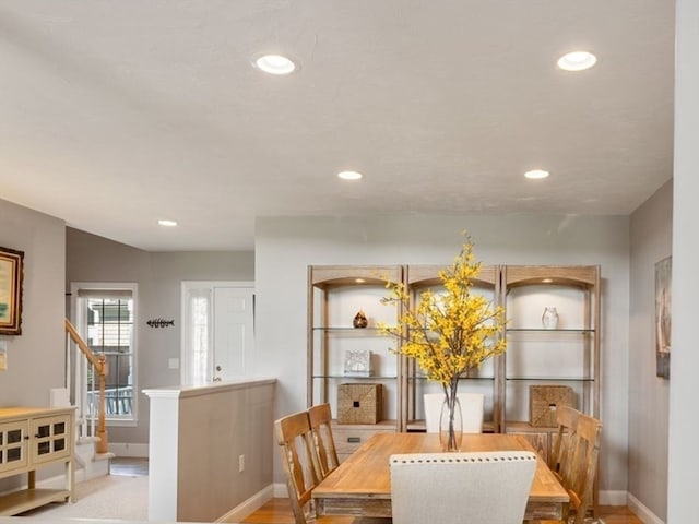 view of carpeted dining space