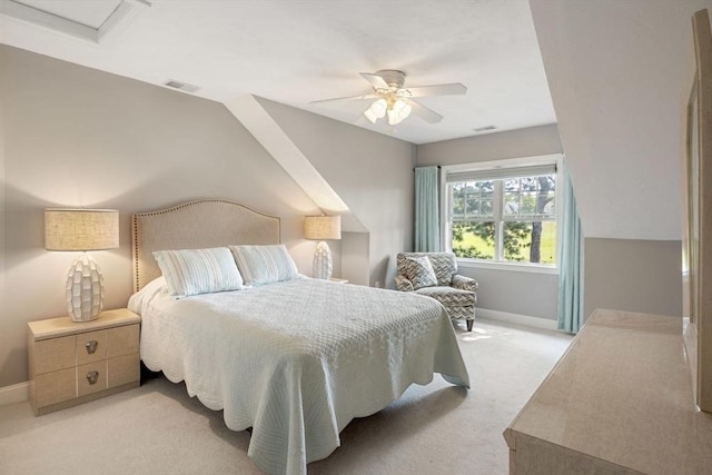 bedroom featuring ceiling fan and light colored carpet