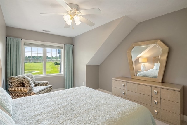 bedroom with ceiling fan and vaulted ceiling