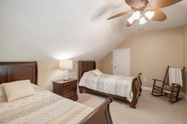 carpeted bedroom with lofted ceiling and ceiling fan