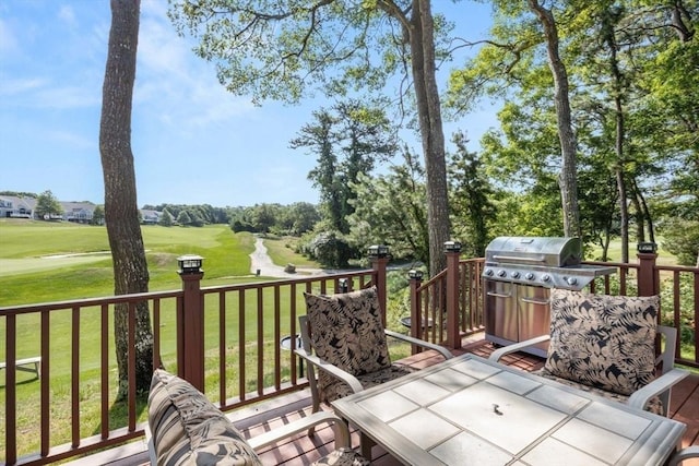 deck featuring a lawn