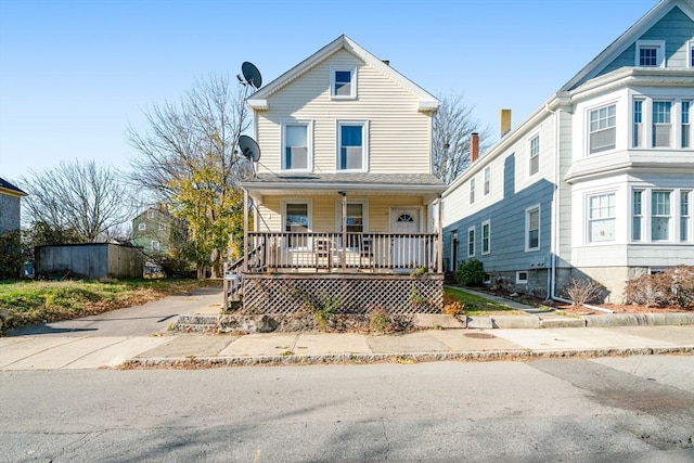 view of property with covered porch