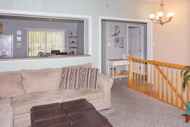 51 Pinecrest Dr Unit 51, Chicopee, MA 01020 - living room featuring a chandelier and carpet