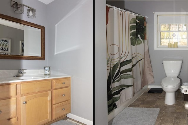 51 Pinecrest Dr Unit 51, Chicopee, MA 01020 - bathroom with toilet, baseboards, vanity, and a shower with shower curtain