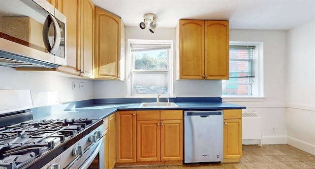 461 Arborway Unit 2, Boston, MA 02130 - kitchen featuring appliances with stainless steel finishes, a sink, and dark countertops