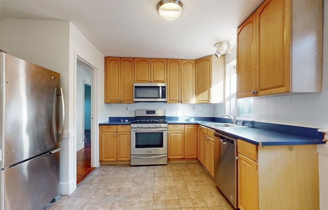 kitchen with sink and stainless steel appliances