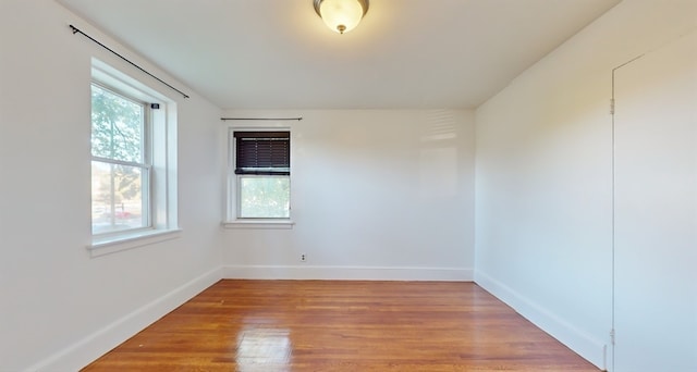 empty room featuring hardwood / wood-style floors