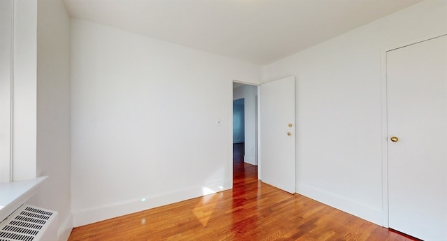 unfurnished bedroom featuring wood-type flooring