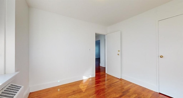461 Arborway Unit 2, Boston, MA 02130 - unfurnished bedroom with wood finished floors and baseboards