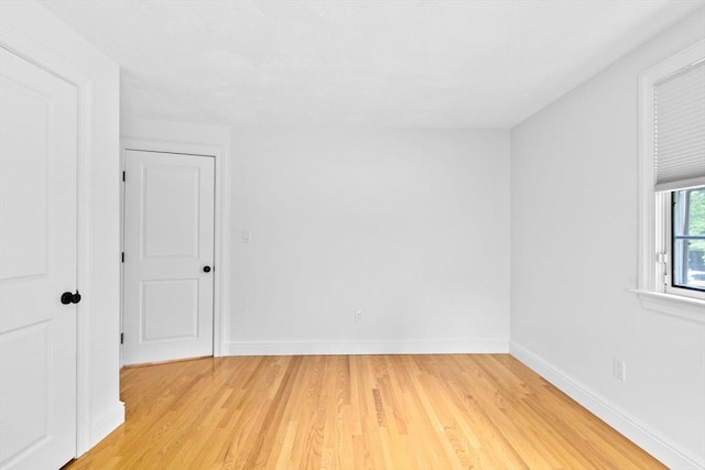 258 Plympton Rd, Plymouth, MA 02360 - empty room with light wood finished floors and baseboards