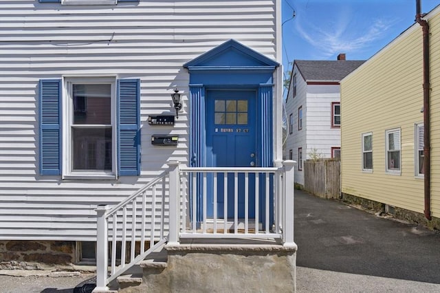 property entrance featuring fence