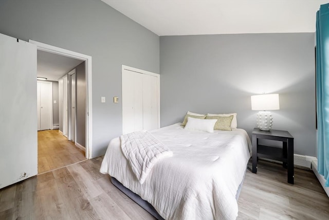 27 Mason Ct Unit 27, Amesbury, MA 01913 - bedroom featuring light wood-style floors, a closet, and baseboards