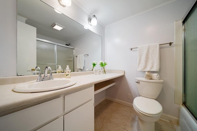 27 Mason Ct Unit 27, Amesbury, MA 01913 - bathroom featuring toilet, vanity, crown molding, tile patterned floors, and baseboards