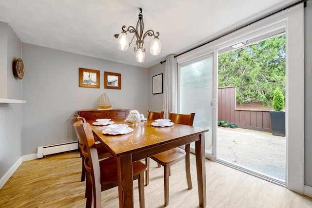 27 Mason Ct Unit 27, Amesbury, MA 01913 - dining room with a baseboard heating unit, light wood-style flooring, a chandelier, and baseboards
