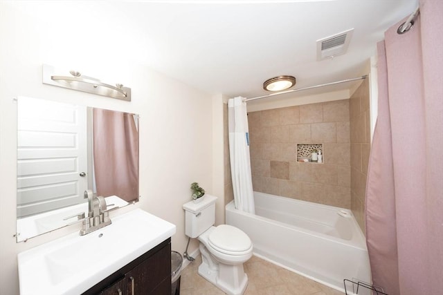 bathroom with vanity, shower / bathtub combination with curtain, visible vents, tile patterned flooring, and toilet