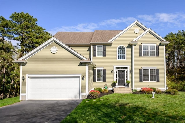 86 Pioneer Trl, Plymouth, MA 02360 - colonial home with asphalt driveway and a front yard