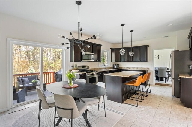86 Pioneer Trl, Plymouth, MA 02360 - dining space featuring a chandelier, light tile patterned floors, and recessed lighting