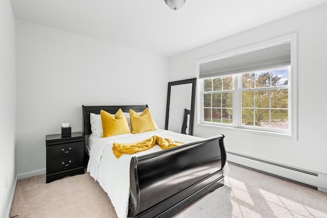 86 Pioneer Trl, Plymouth, MA 02360 - bedroom with light colored carpet, a baseboard heating unit, and baseboards