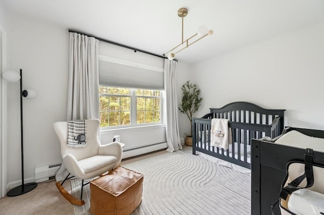 86 Pioneer Trl, Plymouth, MA 02360 - bedroom featuring a baseboard radiator, carpet floors, and a nursery area
