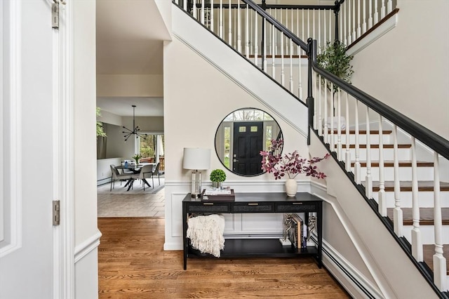 86 Pioneer Trl, Plymouth, MA 02360 - stairway featuring wood finished floors and baseboard heating