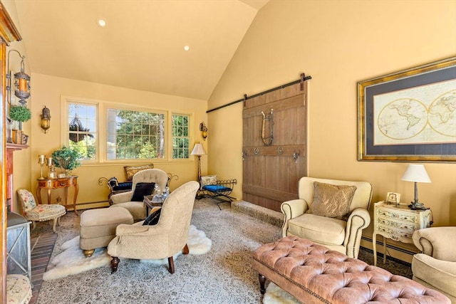 sitting room featuring a barn door, a baseboard radiator, high vaulted ceiling, and a baseboard heating unit