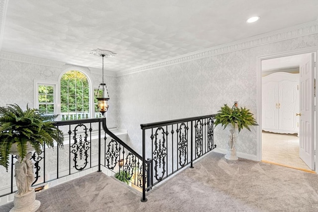 hallway featuring an upstairs landing