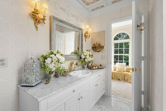 bathroom with marble finish flooring, vanity, ensuite bath, and wallpapered walls