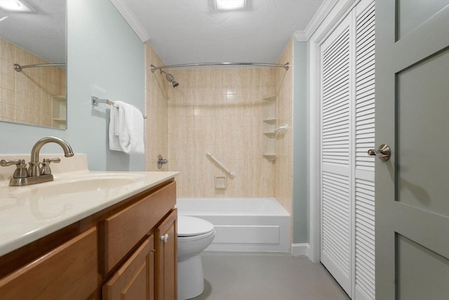 full bath with a closet, toilet, vanity, crown molding, and washtub / shower combination
