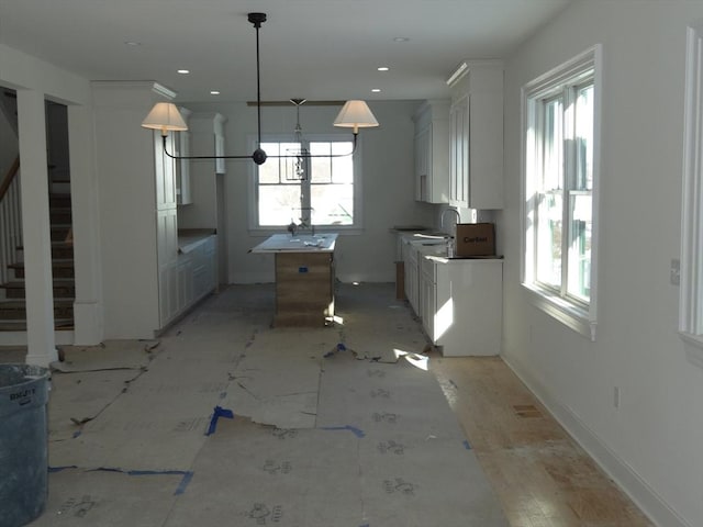 unfurnished dining area with sink