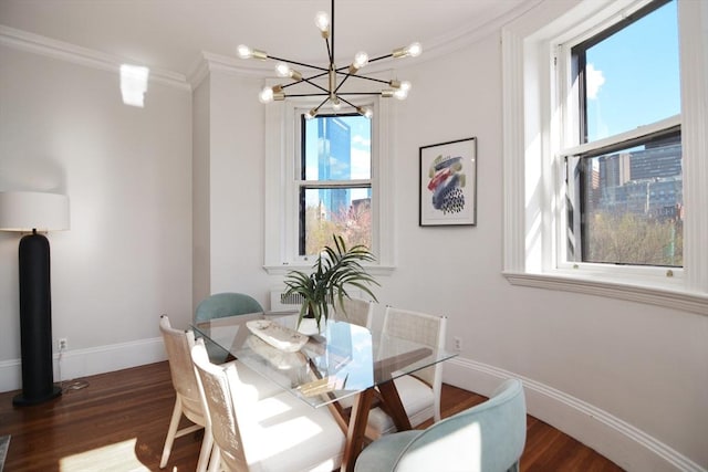 dining space featuring baseboards, dark wood-type flooring, and ornamental molding