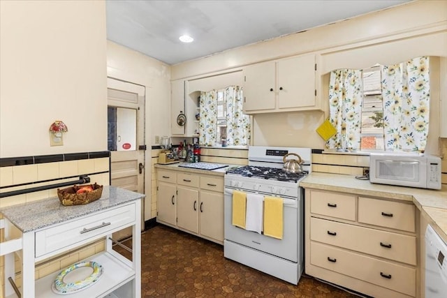 13 Conwell Ave, Somerville, MA 02144 - kitchen featuring light countertops and white appliances