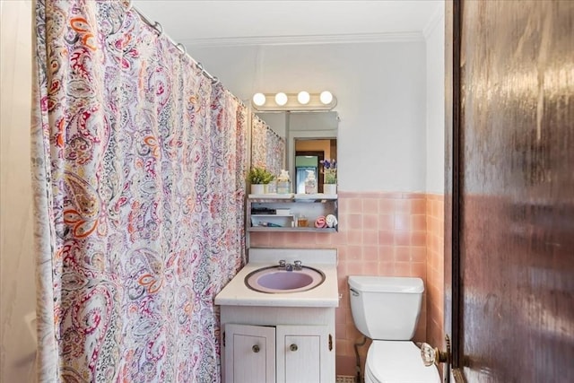 13 Conwell Ave, Somerville, MA 02144 - full bath with a shower with curtain, vanity, a wainscoted wall, toilet, and ornamental molding