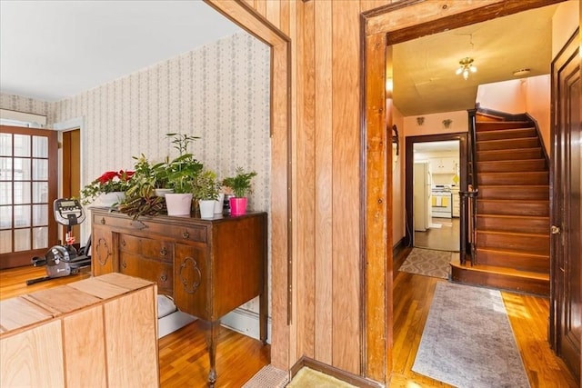 13 Conwell Ave, Somerville, MA 02144 - hallway with wallpapered walls, wood finished floors, and stairway