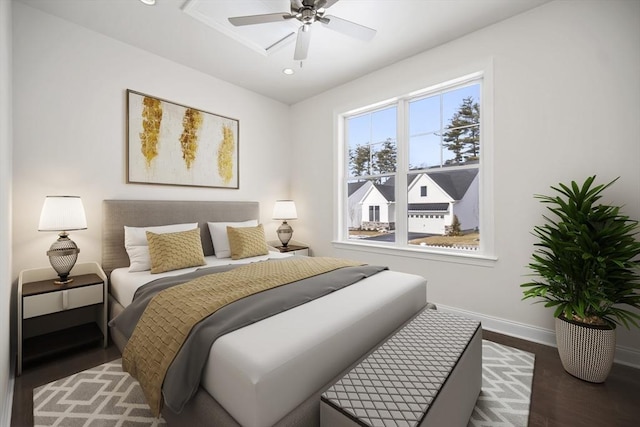 bedroom featuring dark wood-type flooring and ceiling fan