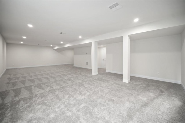 basement with light colored carpet