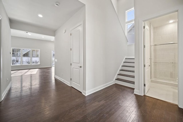 hallway featuring dark wood-type flooring