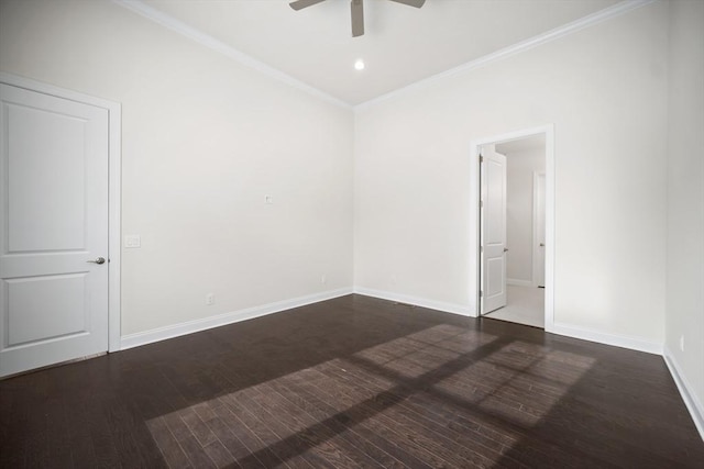 spare room with crown molding, dark hardwood / wood-style floors, and ceiling fan