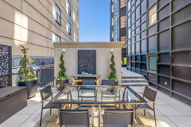 view of patio with outdoor dining area
