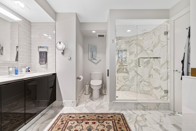 bathroom featuring visible vents, vanity, marble finish floor, toilet, and a marble finish shower